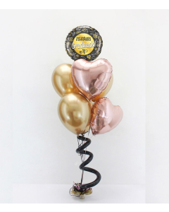 Bouquet con Helio Certificado, con globos de microfoil redondos y corazones y látex, sostenidos por un tuft como base con un espiral